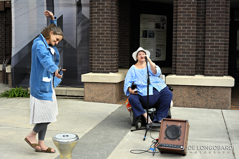 Standing up for music with Abby the Spoon Lady (left)